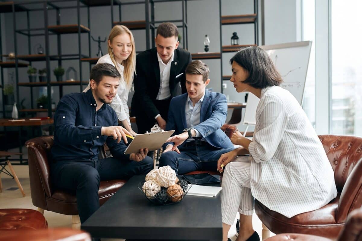 Image of a handful of agents looking at an exclusive listing.