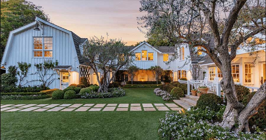 picture of large home at dusk