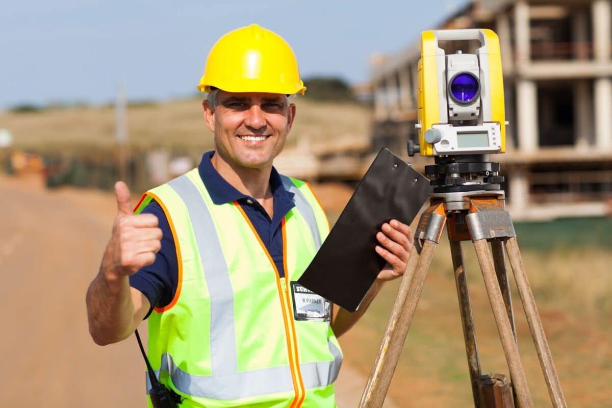 Land surveyor giving thumb up.