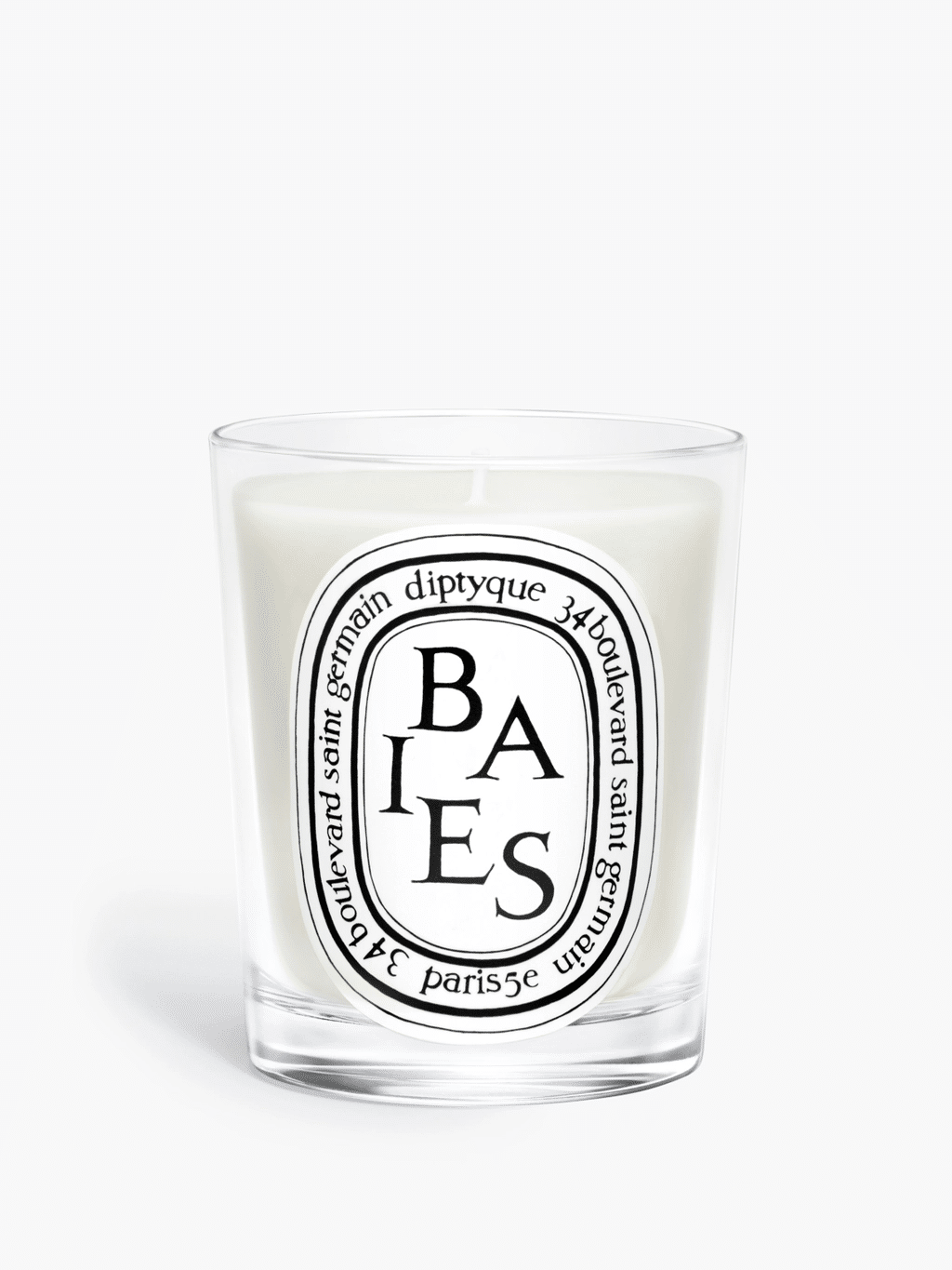 Screenshot of white candle in clear glass jar with black and white logo in front