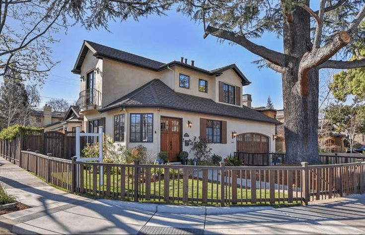 Fenced-in corner house and lot