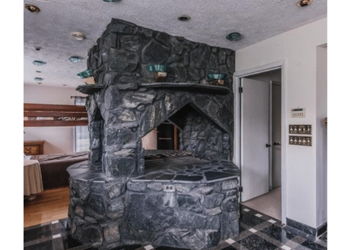 Dark stone bedroom feature