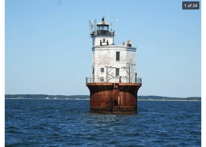 Creepy lighthouse in water